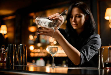 Bartender shaking a cocktail